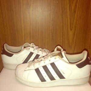 Low top adidas sneakers.